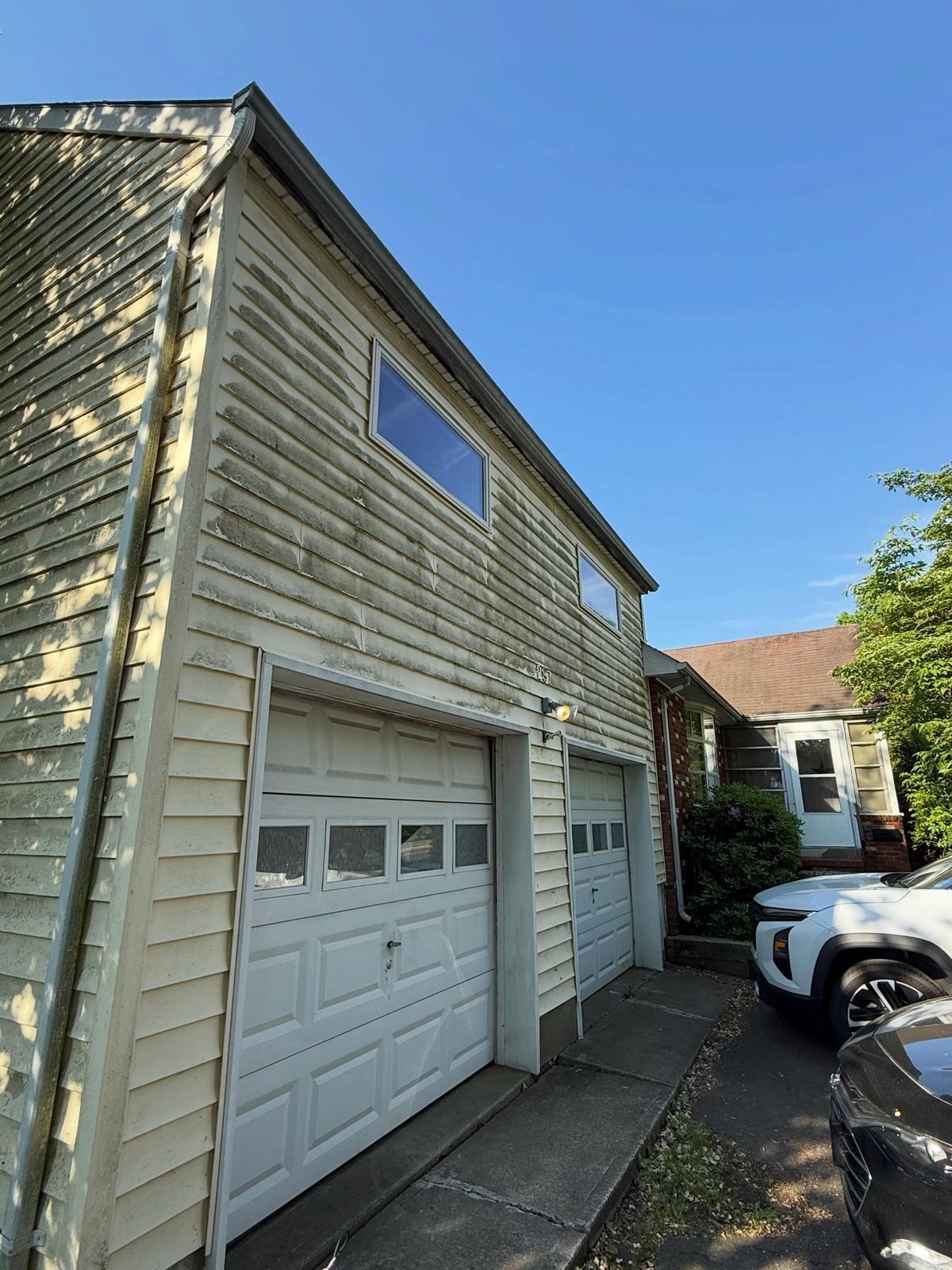 Garage siding side, dirty — Catanzaro's Power Washing