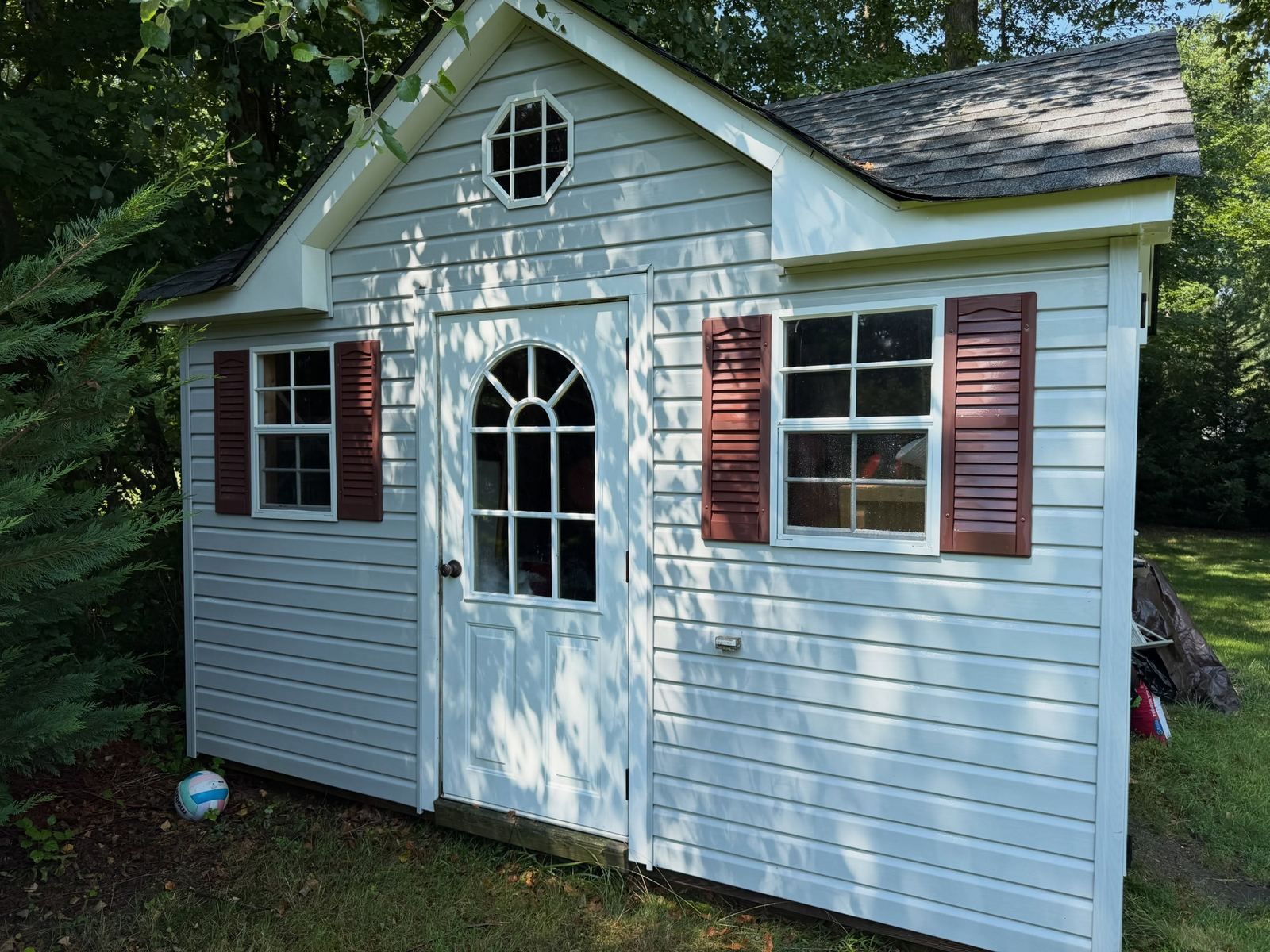 Garden shed with arched windows, before — Catanzaro's Power Washing