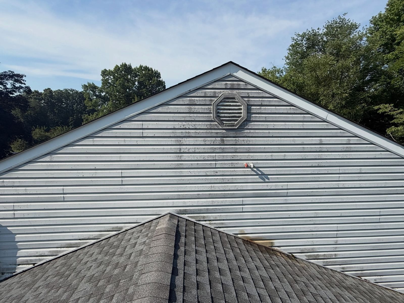 Gray gable with streaks, before — Catanzaro's Power Washing