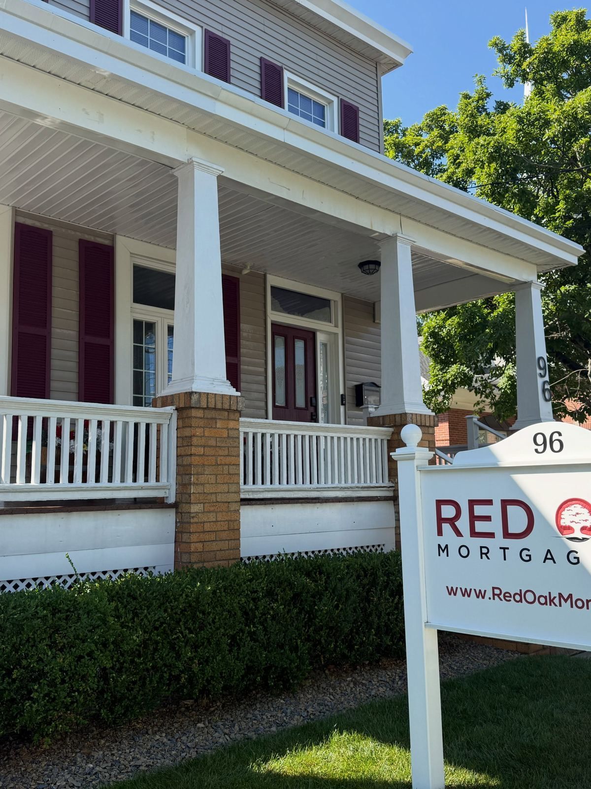 Porch house with realtor sign — Catanzaro's Power Washing