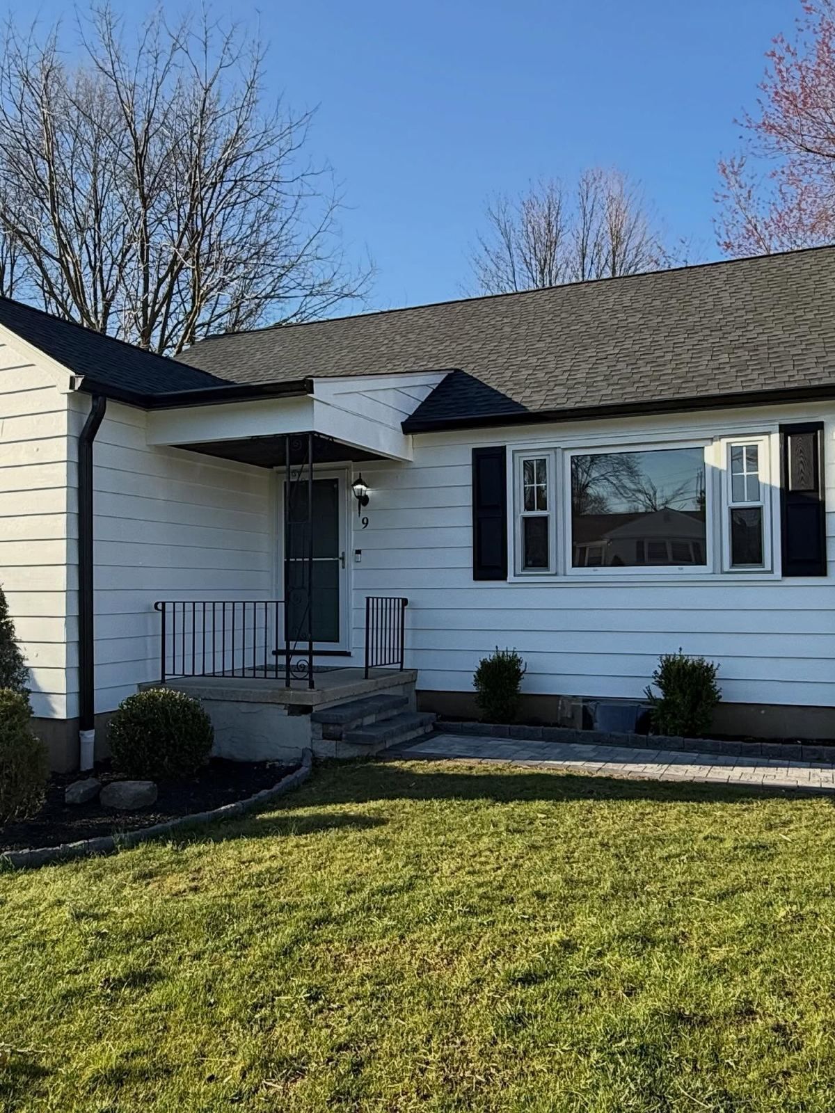 Ranch front with black shutters — Catanzaro's Power Washing