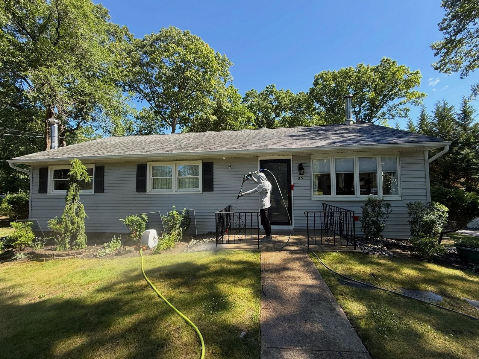 Ranch front, crew washing walk — Catanzaro's Power Washing