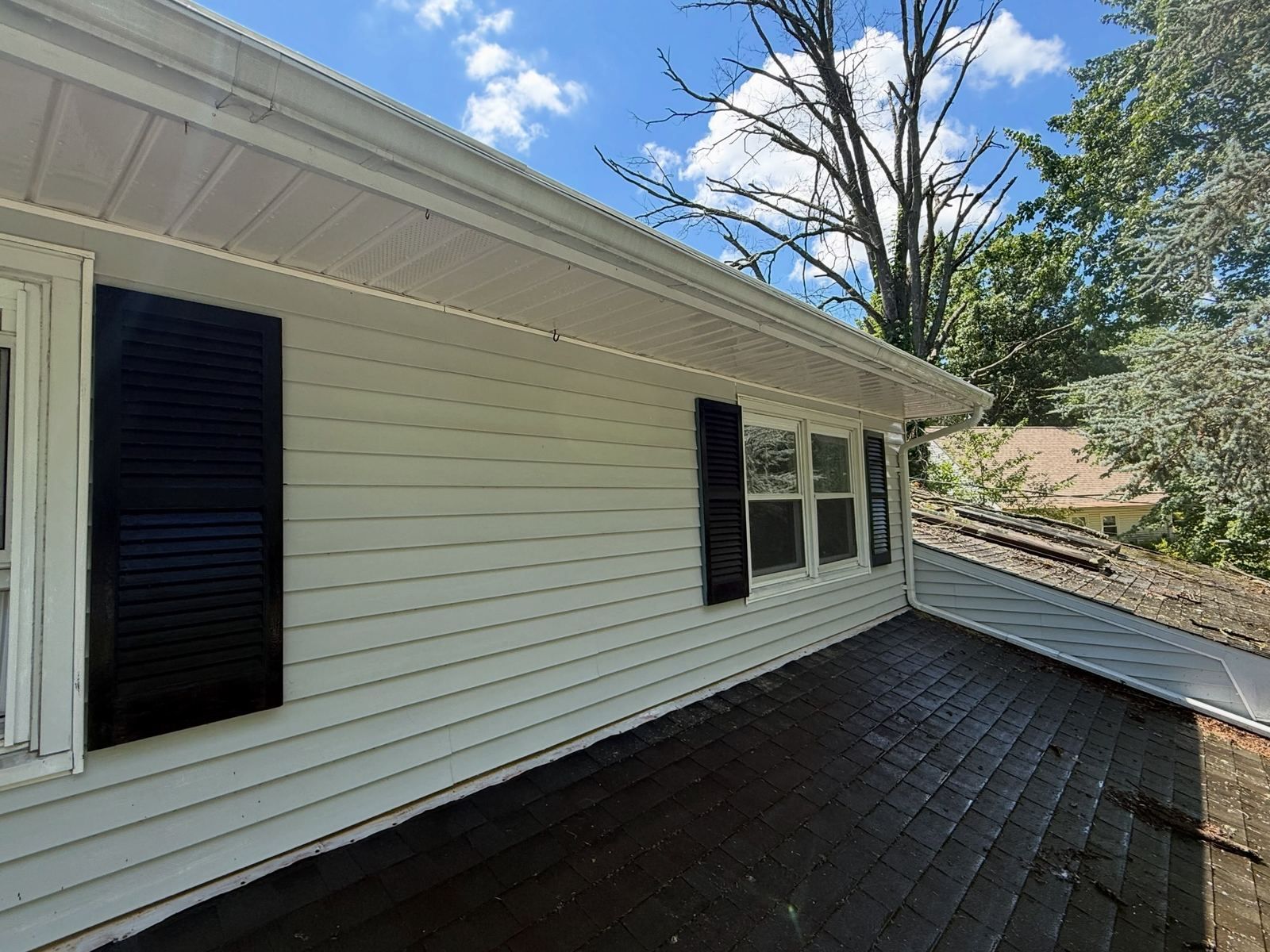Ranch side with black shutters, washed — Catanzaro's Power Washing
