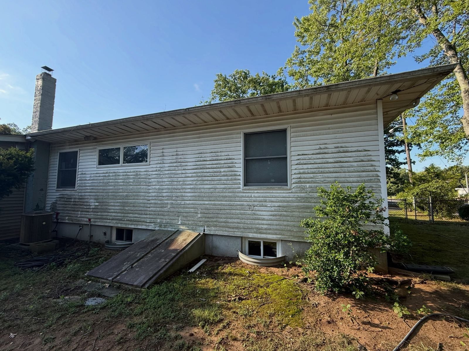 Ranch siding mid-wash — Catanzaro's Power Washing