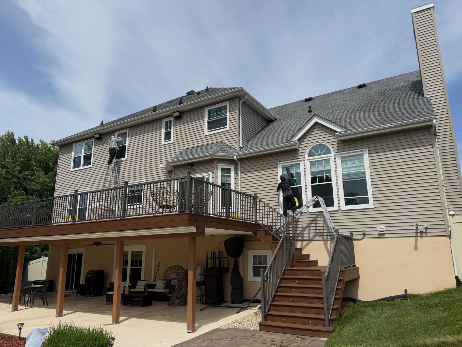 Rear deck and siding, crew on ladder — Catanzaro's Power Washing