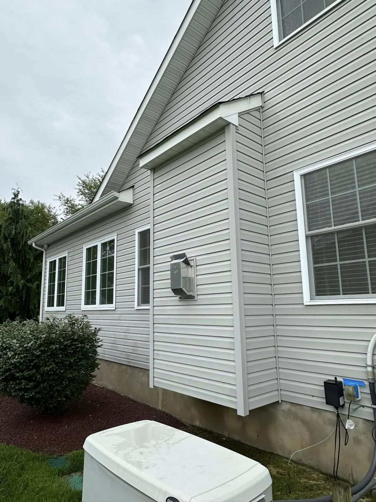 Side wall of white siding — Catanzaro's Power Washing
