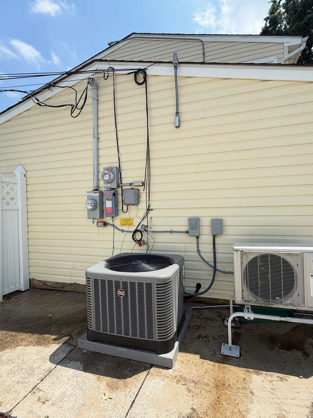 Siding behind AC units — Catanzaro's Power Washing