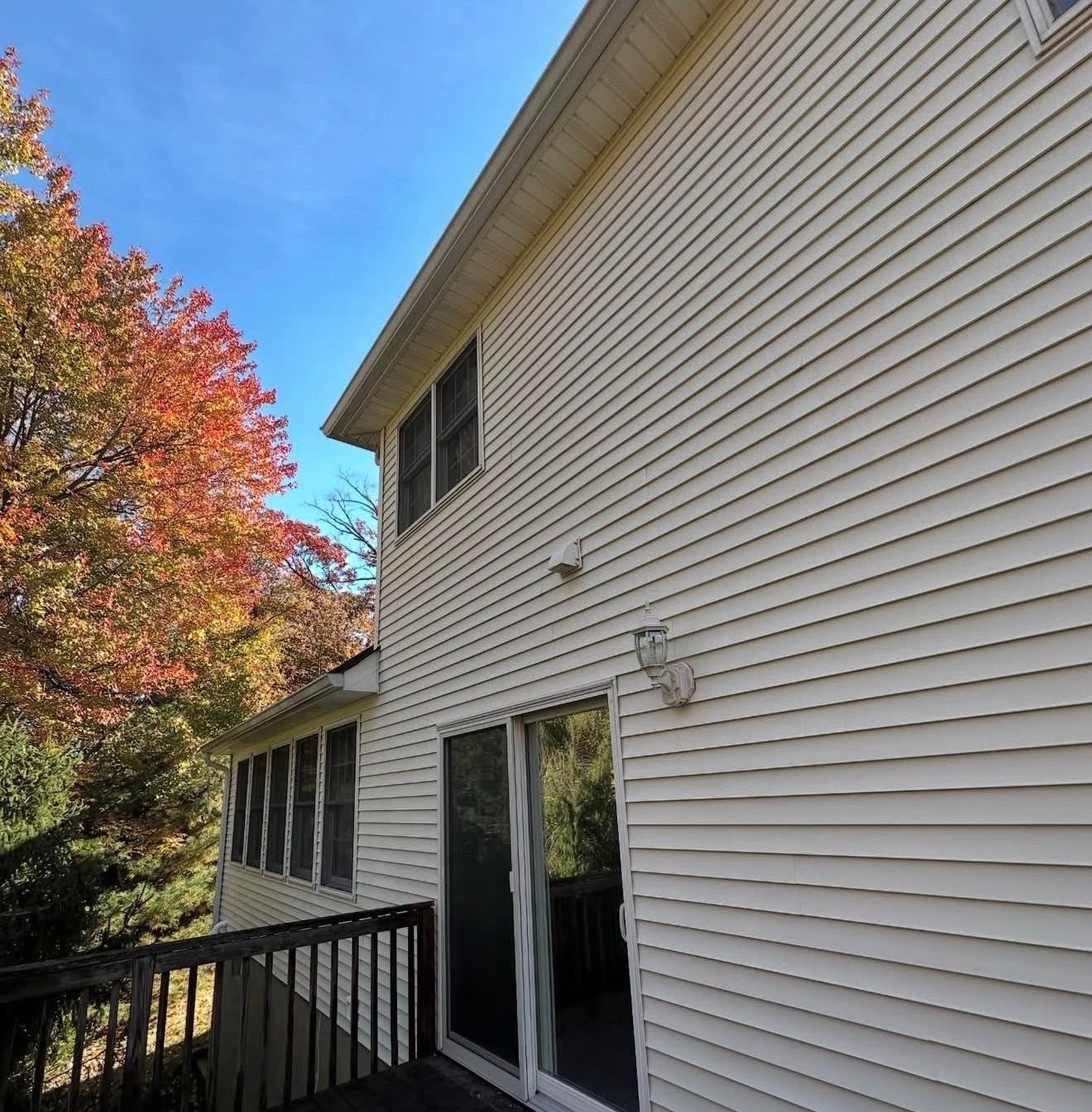 Siding rear with fall tree — Catanzaro's Power Washing