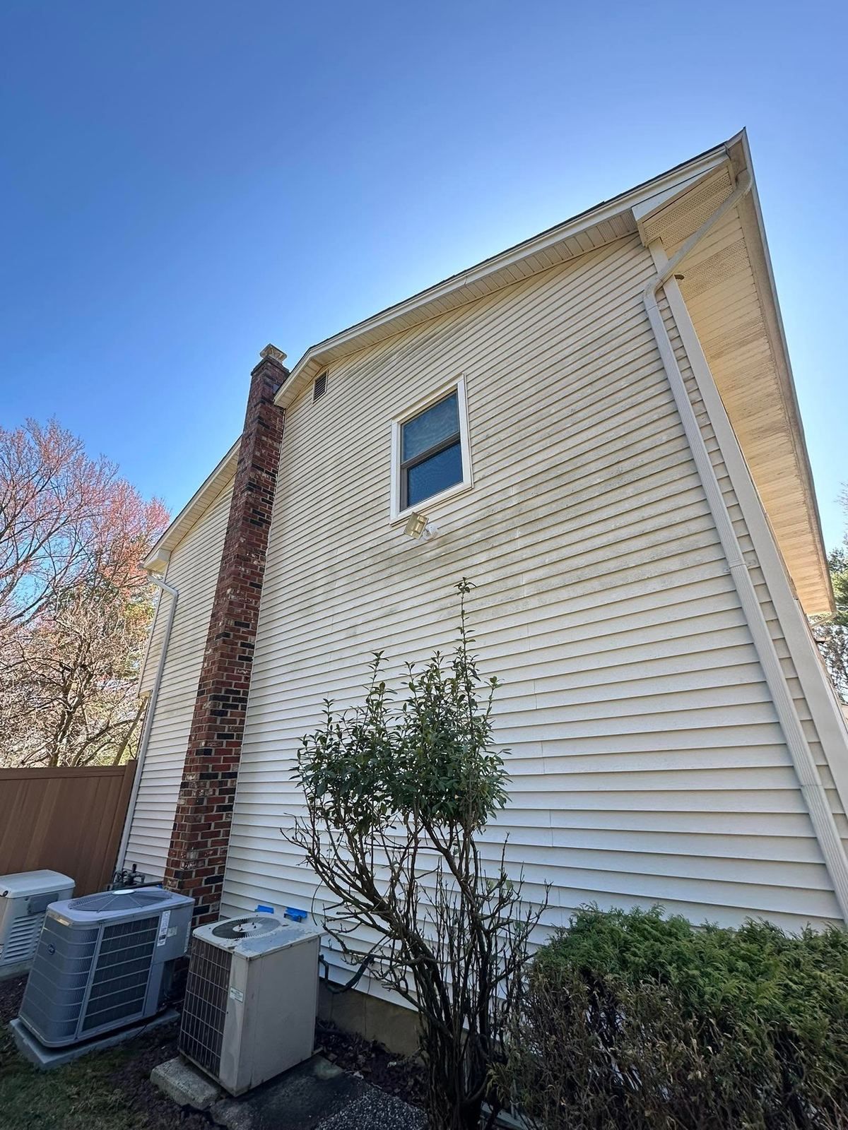 Siding side with chimney — Catanzaro's Power Washing