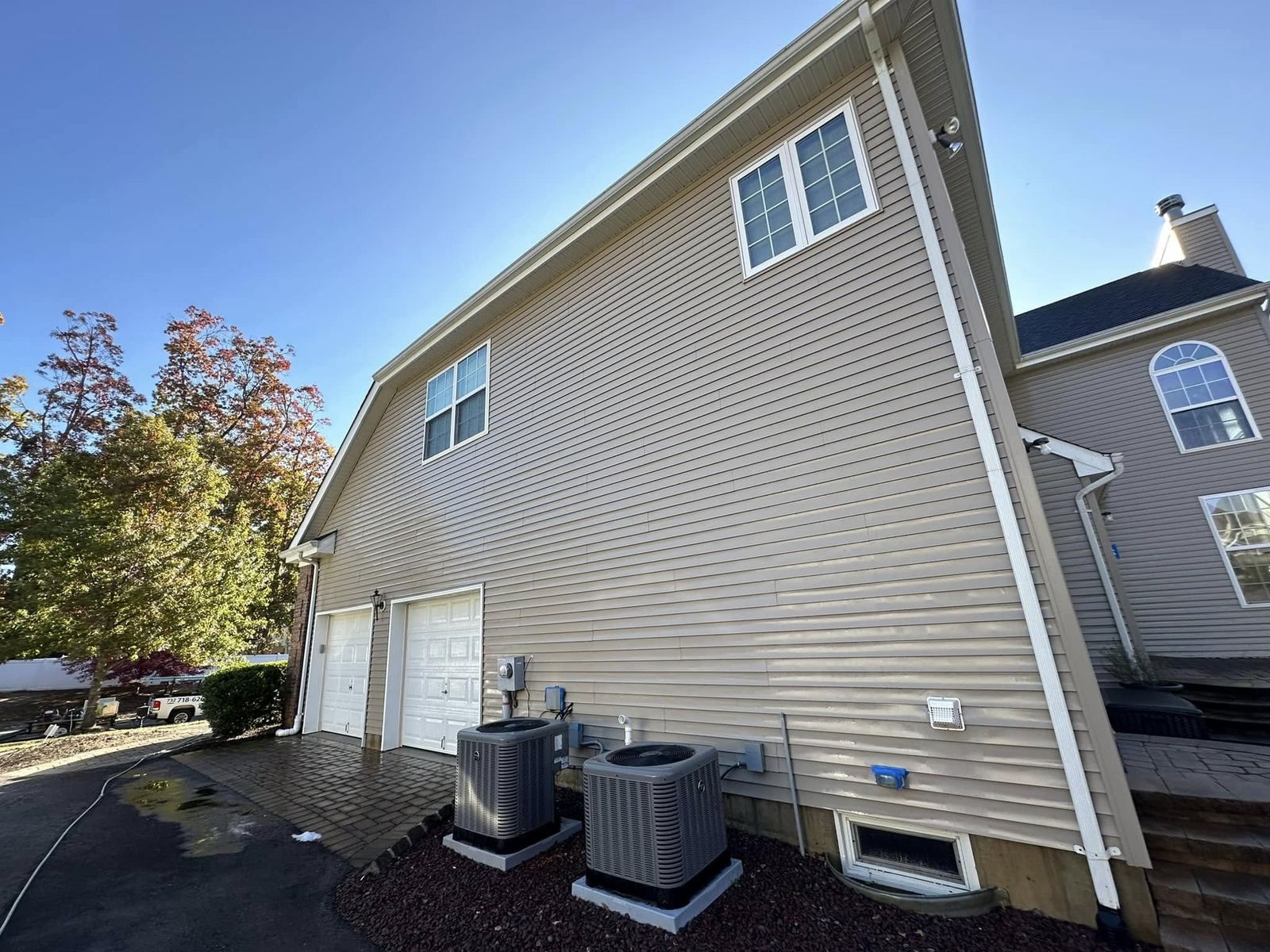 Siding wide shot with AC units — Catanzaro's Power Washing