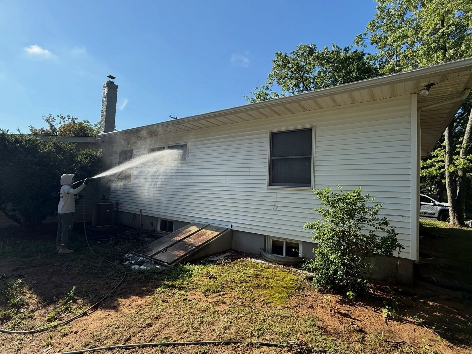 Crew soft washing ranch siding — Catanzaro's Power Washing
