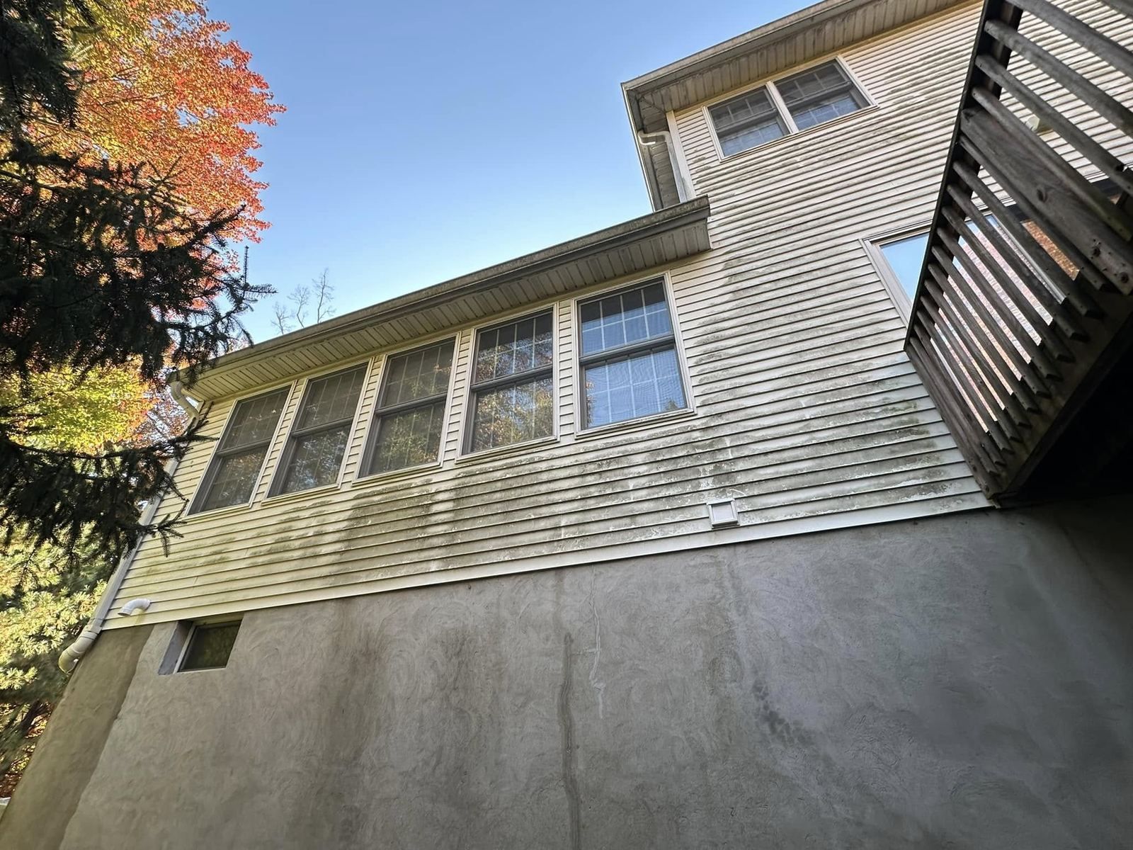 Sunroom siding over block foundation — Catanzaro's Power Washing