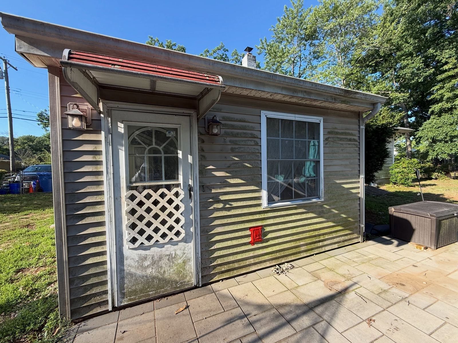 Tan addition with streaks, before — Catanzaro's Power Washing