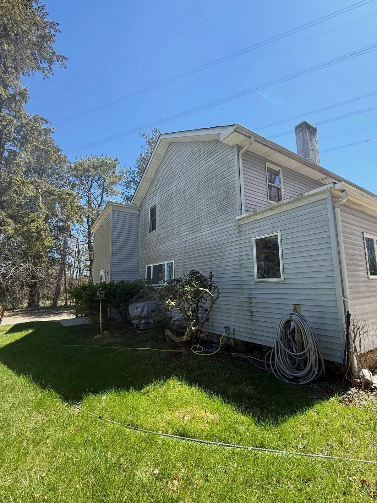 Two-story side with hose, washing — Catanzaro's Power Washing