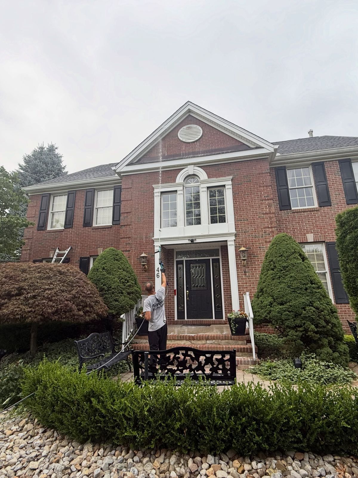 Crew washing brick colonial front — Catanzaro's Power Washing