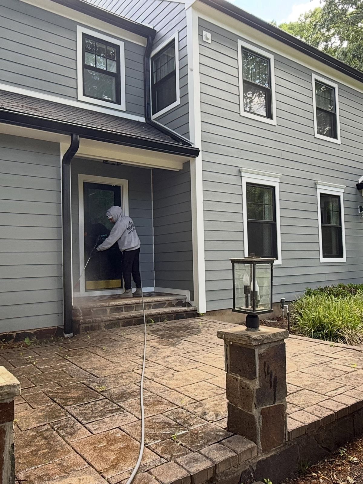 Crew washing gray colonial entry — Catanzaro's Power Washing