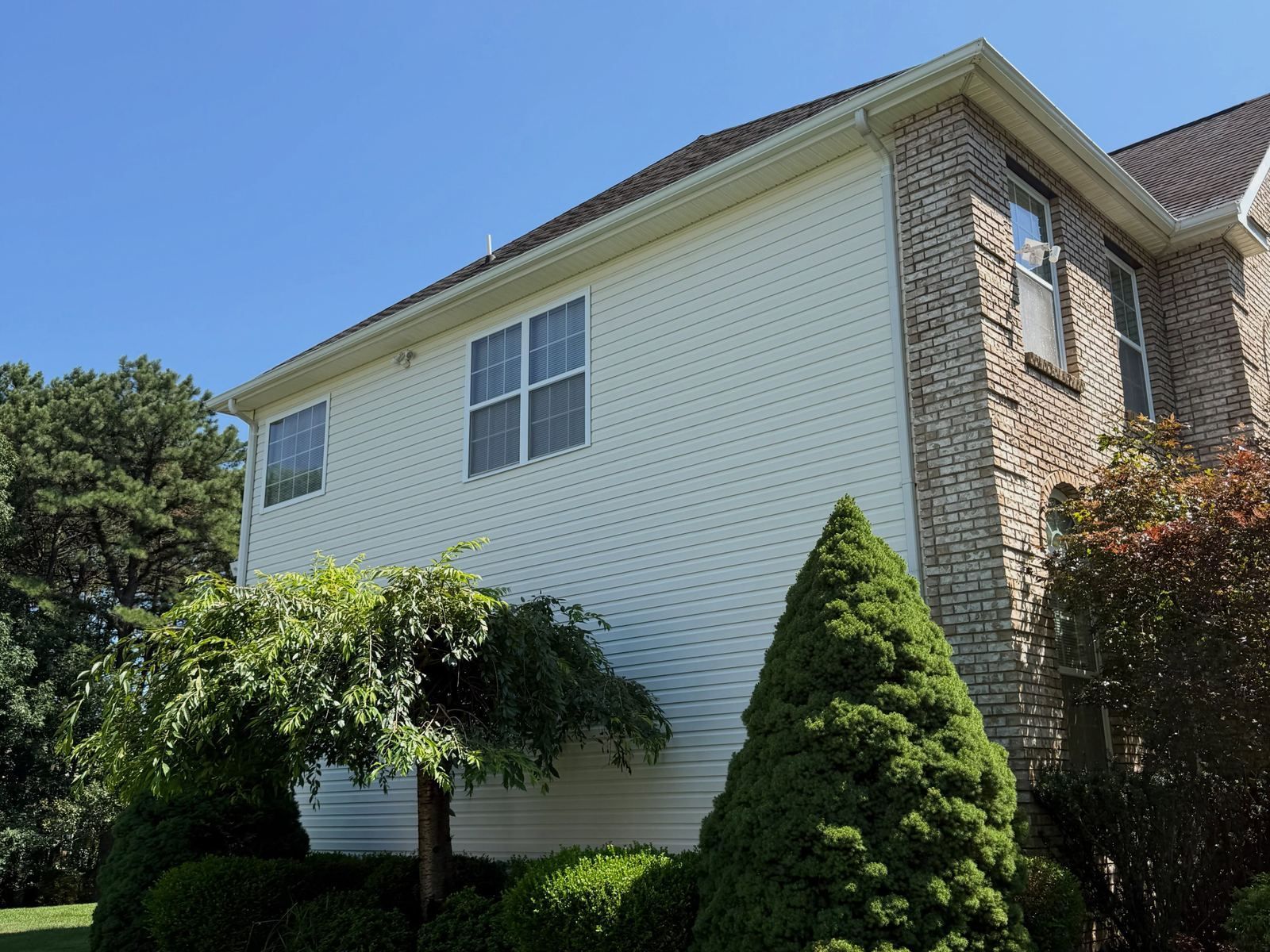 White siding side of brick colonial — Catanzaro's Power Washing