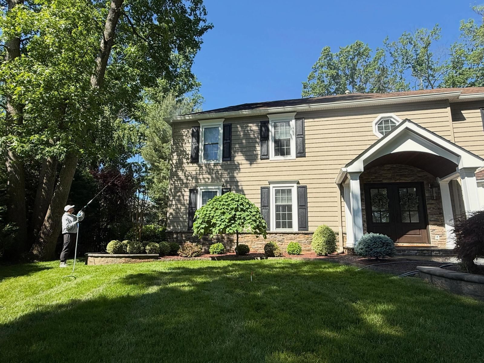Yellow colonial front — Catanzaro's Power Washing