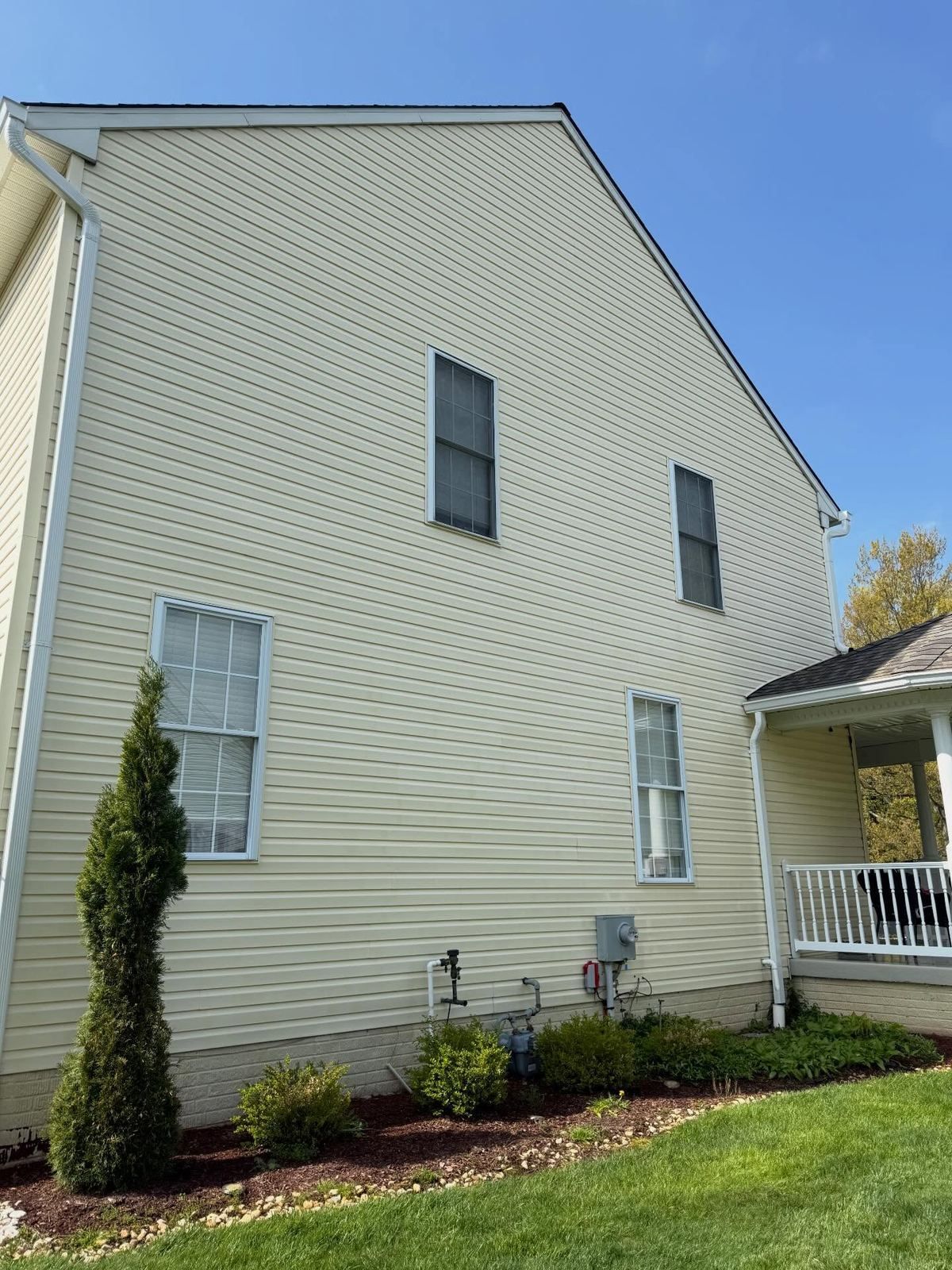 Yellow siding side — Catanzaro's Power Washing