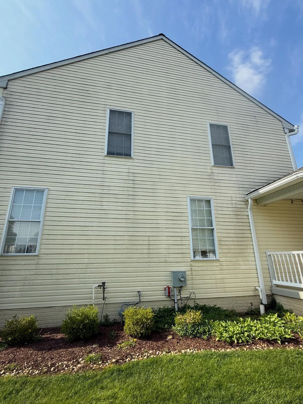 Yellow siding side — Catanzaro's Power Washing