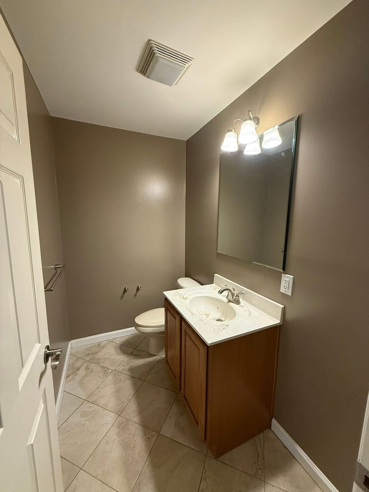 Bathroom repainted taupe — Catanzaro's Power Washing