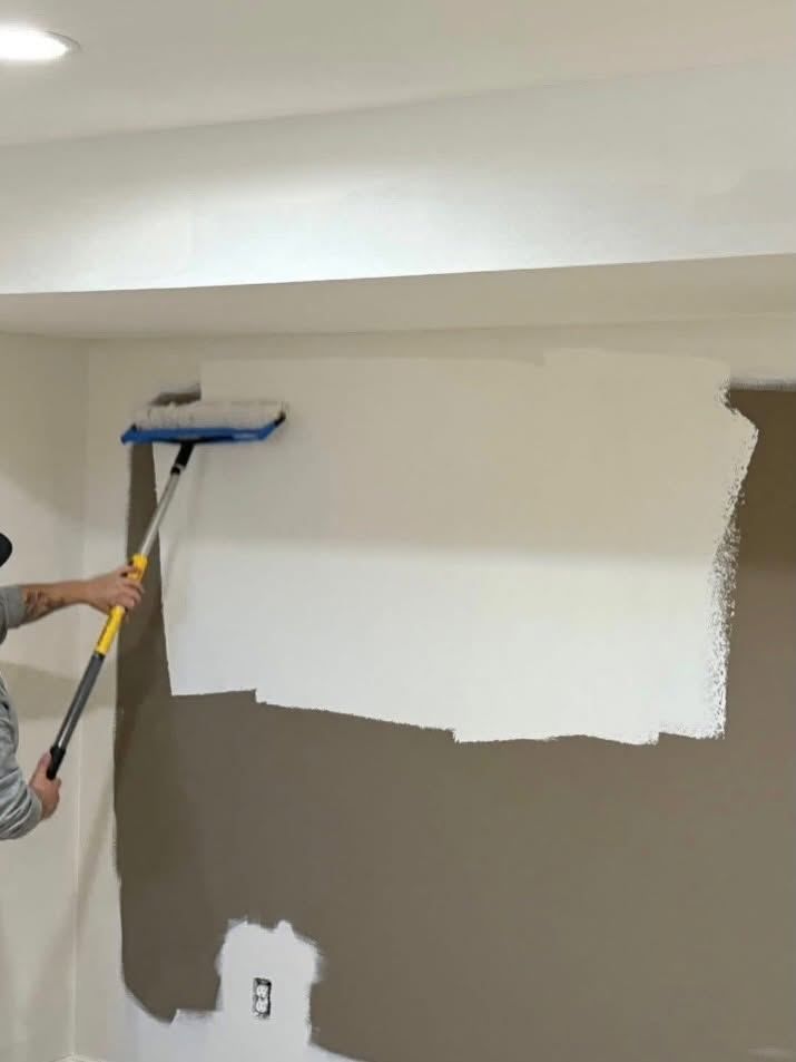 Wall half repainted, close-up — Catanzaro's Power Washing
