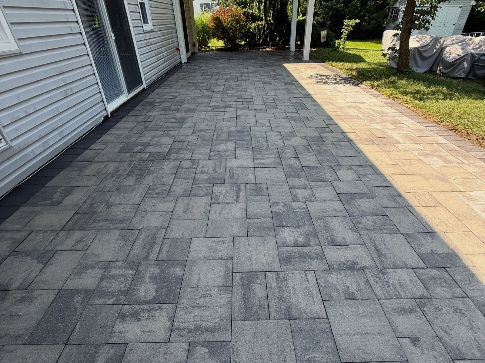 Gray stamped patio, cleaned — Catanzaro's Power Washing