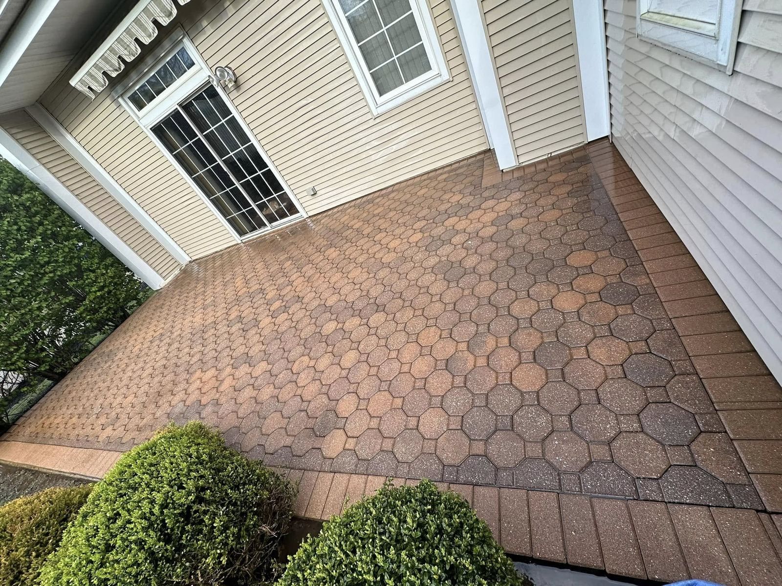 Paver patio corner, cleaned — Catanzaro's Power Washing