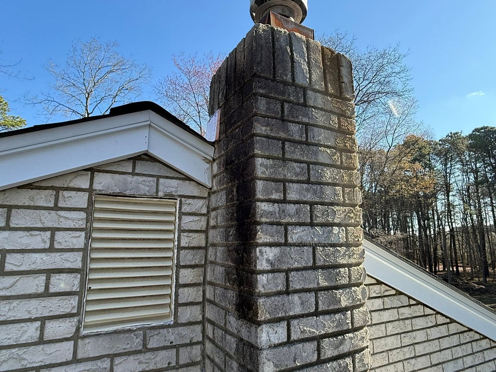 Chimney and gable with black streaks, before — Catanzaro's Power Washing