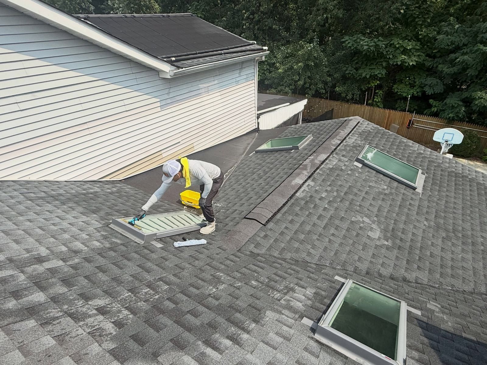 Crew on roof washing skylights — Catanzaro's Power Washing