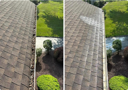 Split-screen roof shingles before and after cleaning, with a green lawn and landscaped yard beside it