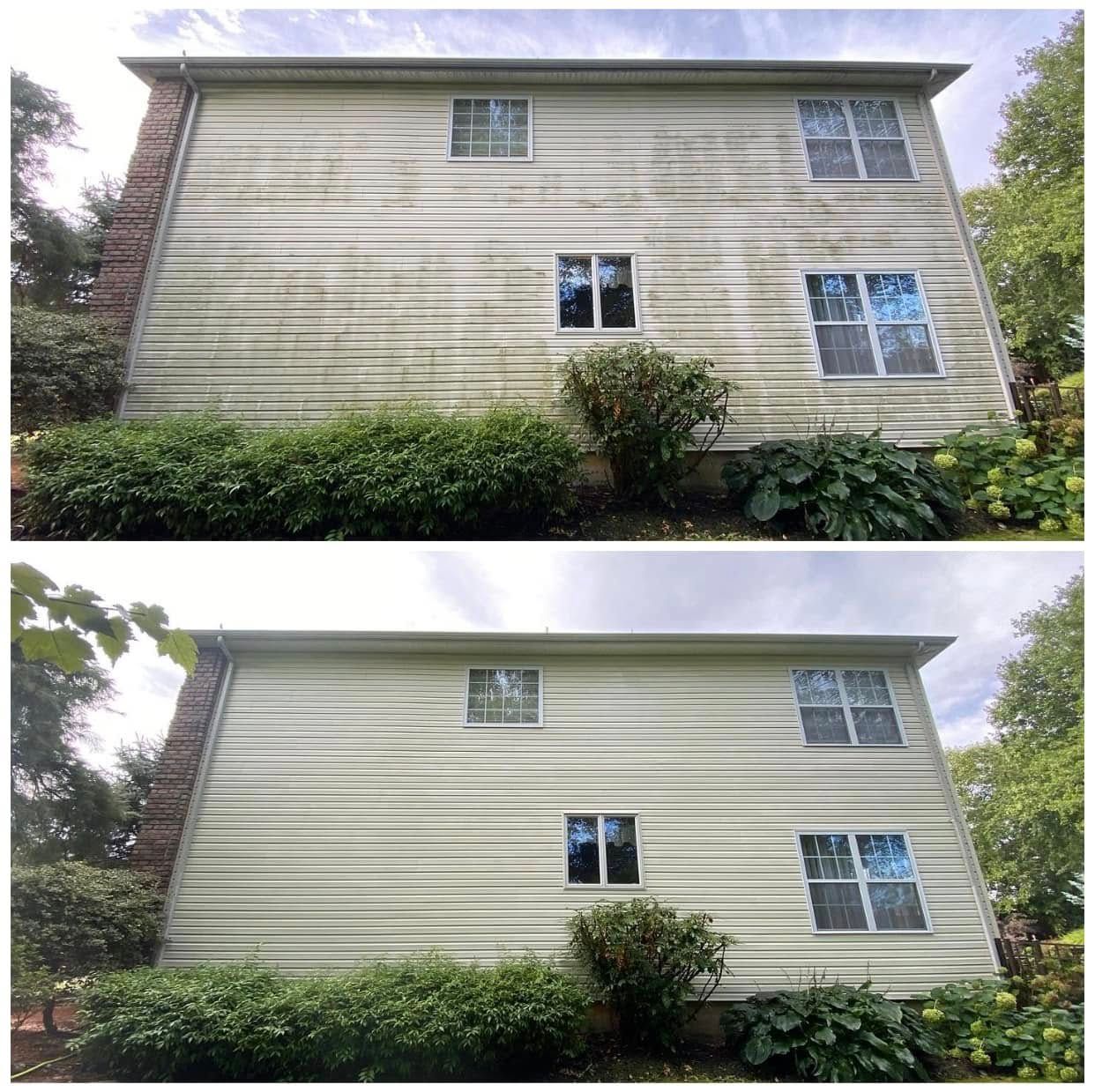Siding before and after a soft wash by Catanzaro's Power Washing