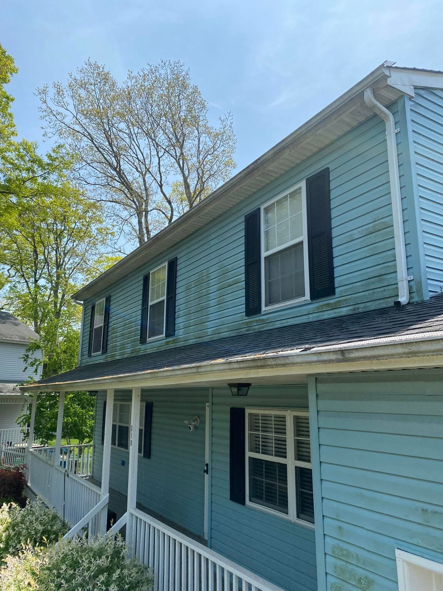 Blue colonial with porch, siding — Catanzaro's Power Washing