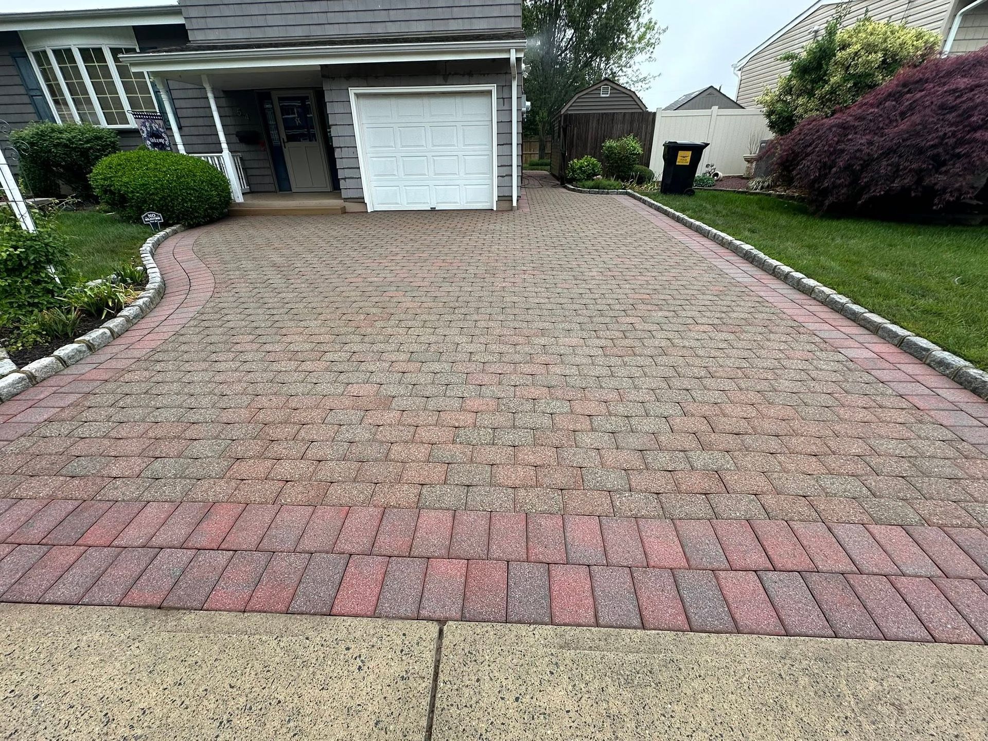 Brick-border paver driveway, cleaned — Catanzaro's Power Washing
