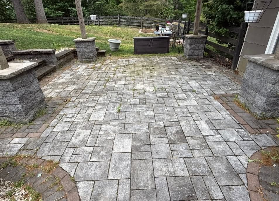 Gray paver patio with pillars, cleaned — Catanzaro's Power Washing
