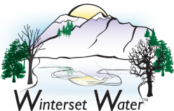 Logo for Winterset Water. Mountains, sun, trees on either side of a body of water, and text