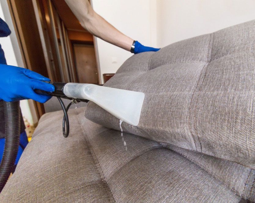 Sofa Undergoing Thorough Vacuum Cleaning by Jacsimpson Cleaning Services - Professional Cleaner in Bangalow