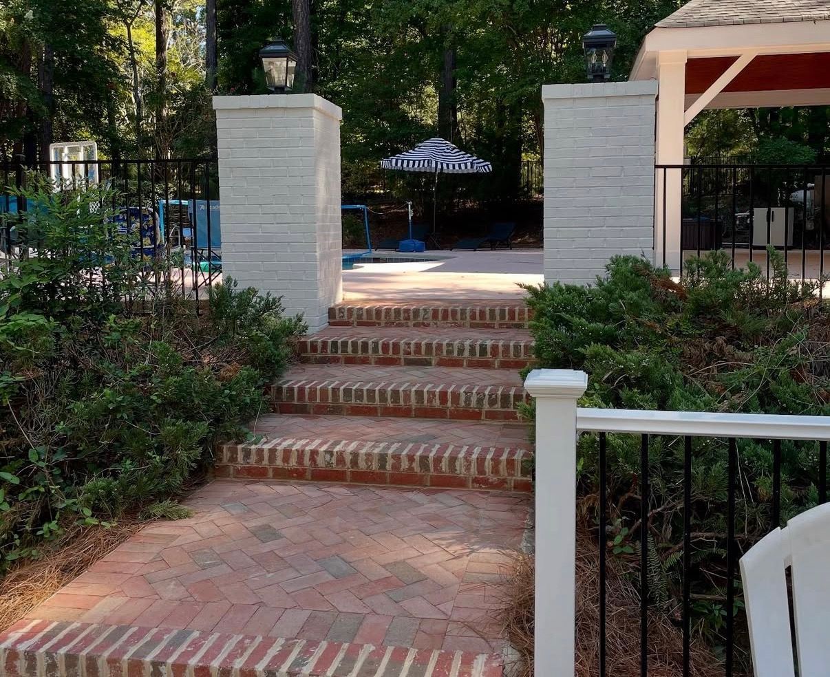 Brick steps leading to a garden patio
