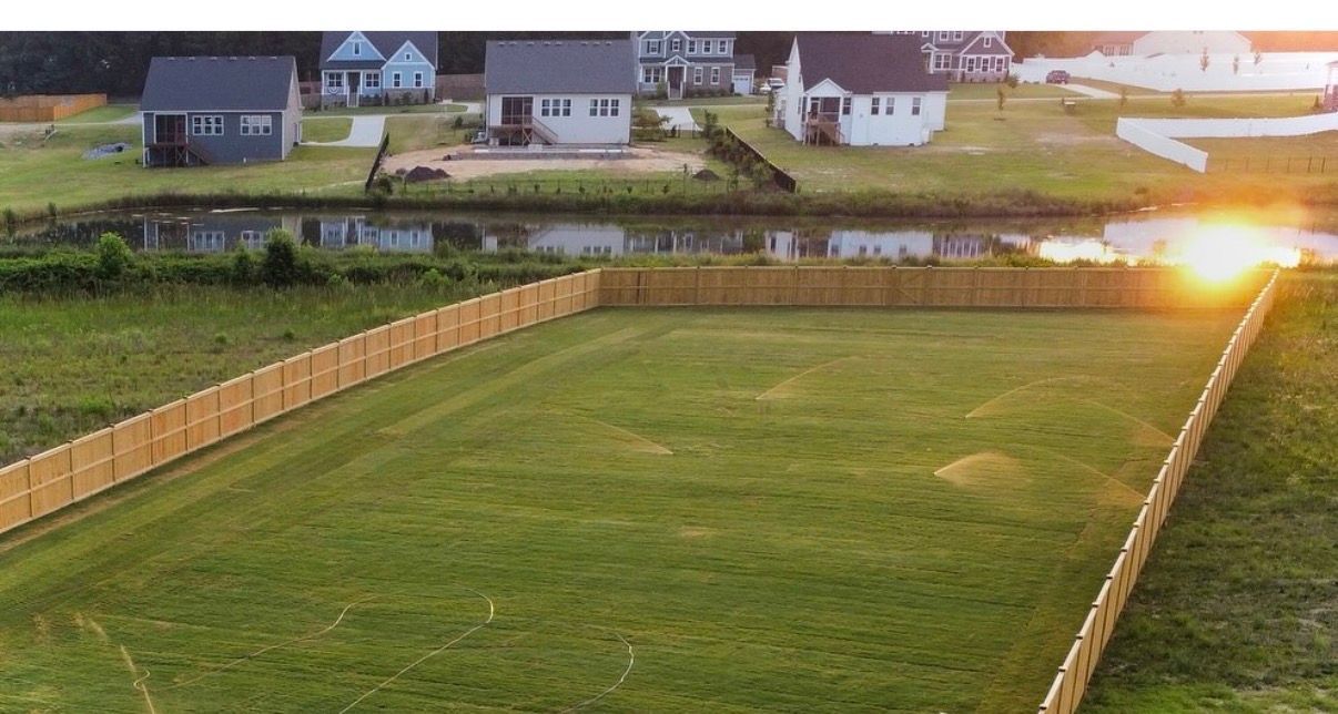 Grassy fenced yard