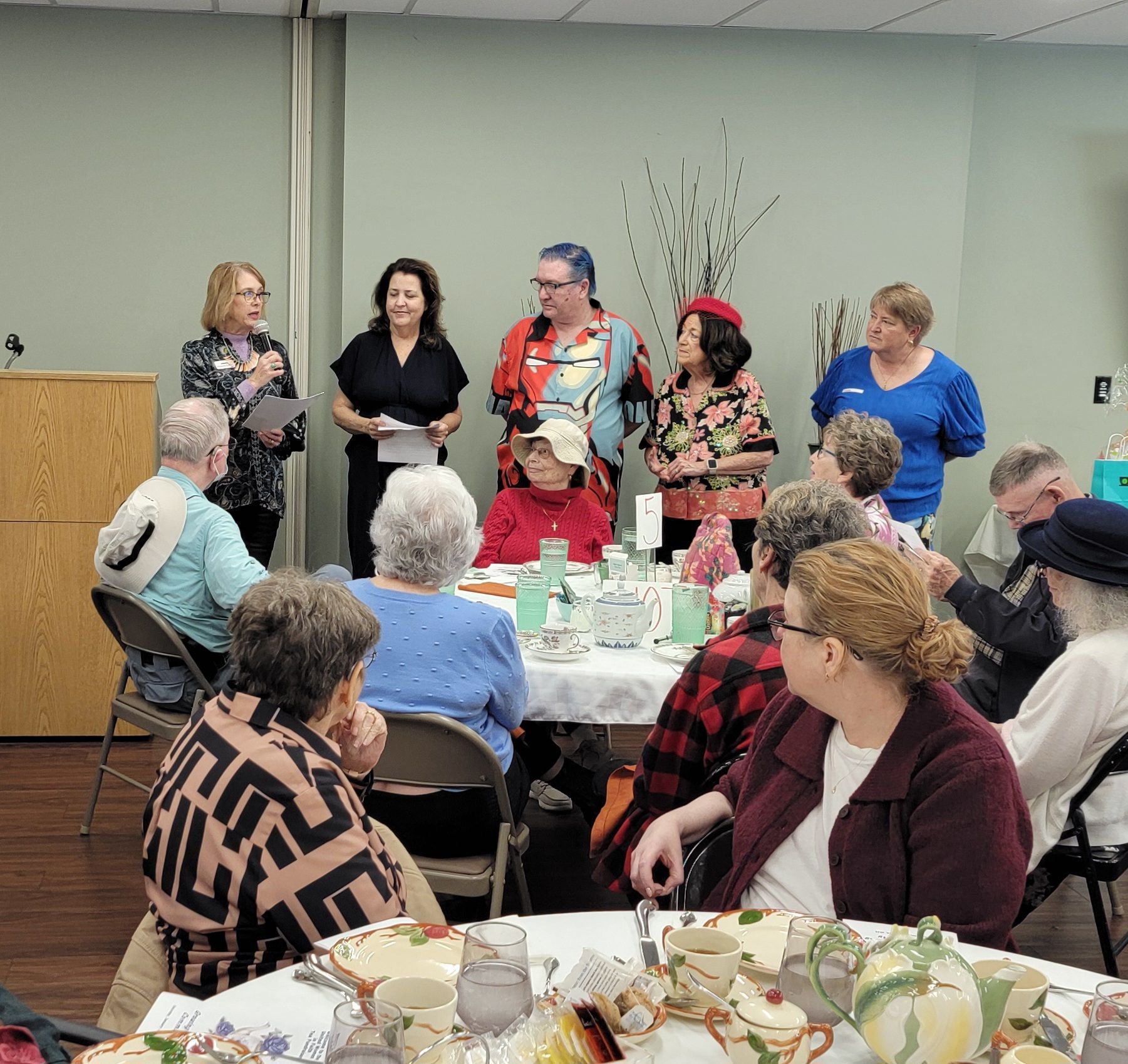 Woman addressing attendees at a monthly meeting of UWF. Woman addressing attendees at a monthly meeting of UWF.