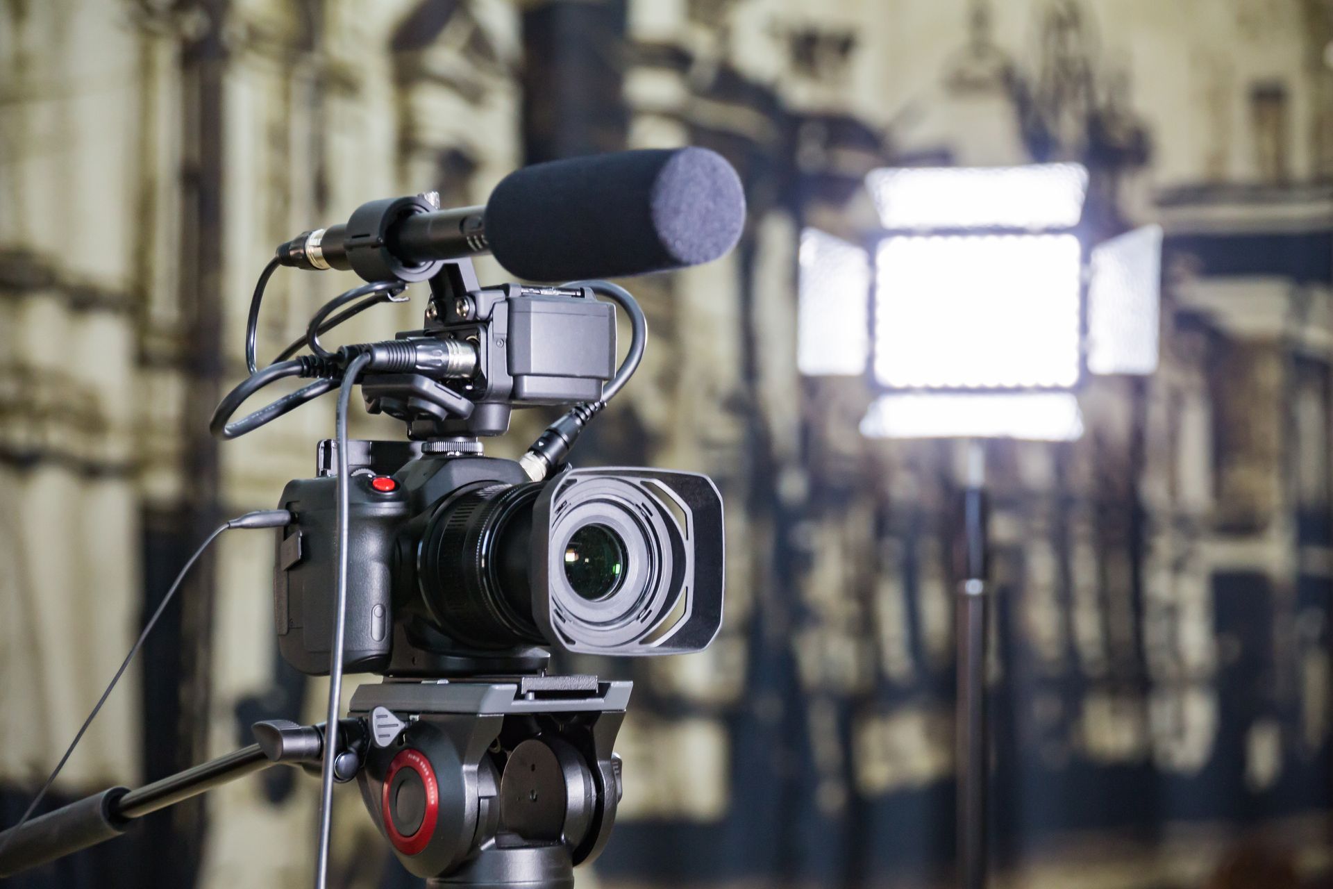 Video camera on tripod.