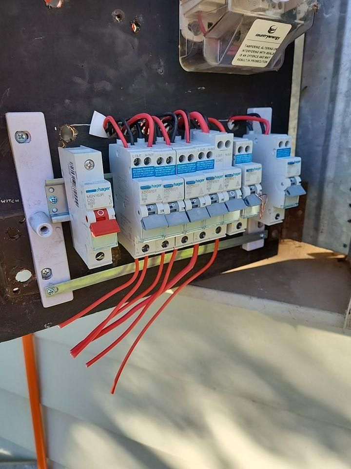 A Close up Of a Electrical Box with Wires Coming out Of It — All Star Electrical Services in Figtree, NSW