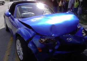 auto wrecker scrapping car in kamloops