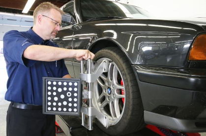 Mechanic Working on Wheels | Nixon Automotive