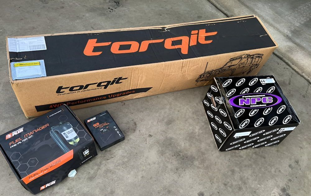 A Box With The Word Torqit On It — Josh's Diesel Services in Boyne Island, QLD