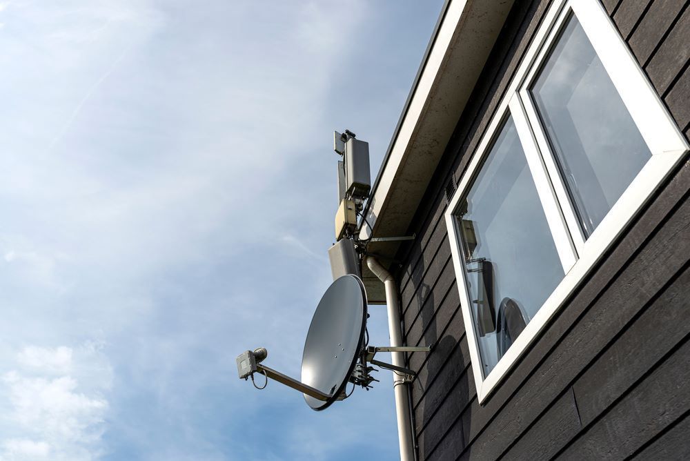 A Satellite Dish and Antennas Are Mounted — BTV Antenna & Data in Coonarr, QLD