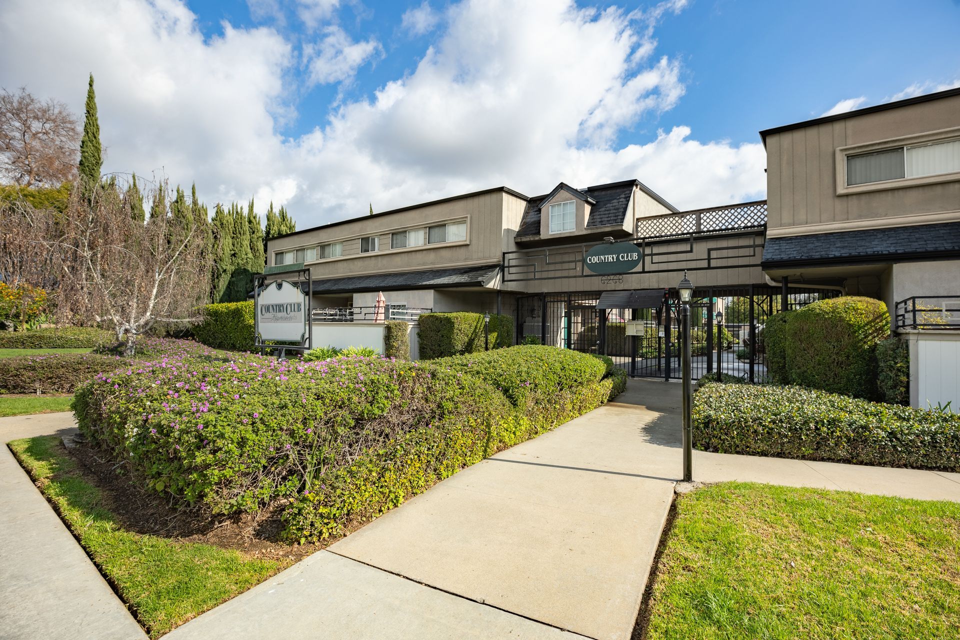 A large building with a walkway leading to it.