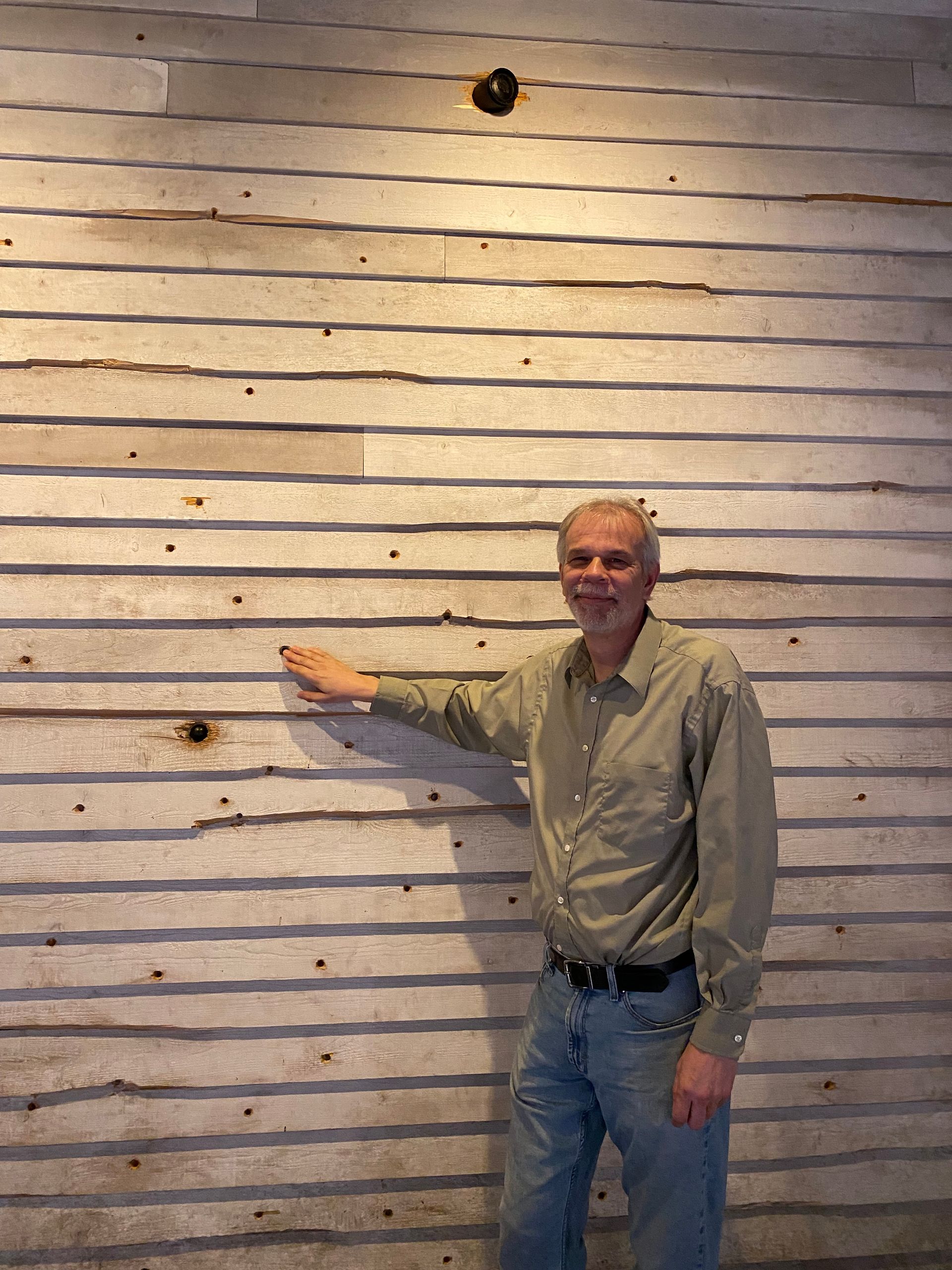 Tim Smith by the Caught in the Crossfire  house, at the Beyond the  Battle Museum