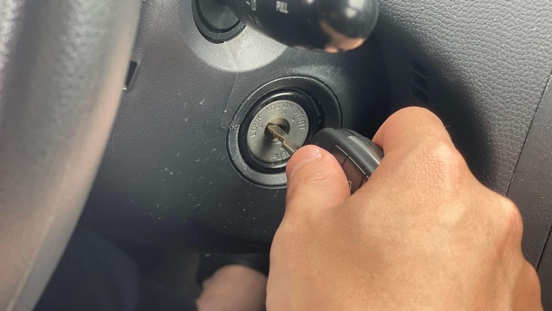 A Person Is Starting a Car with A Key | Westminster, CO | M.L. Locksmith