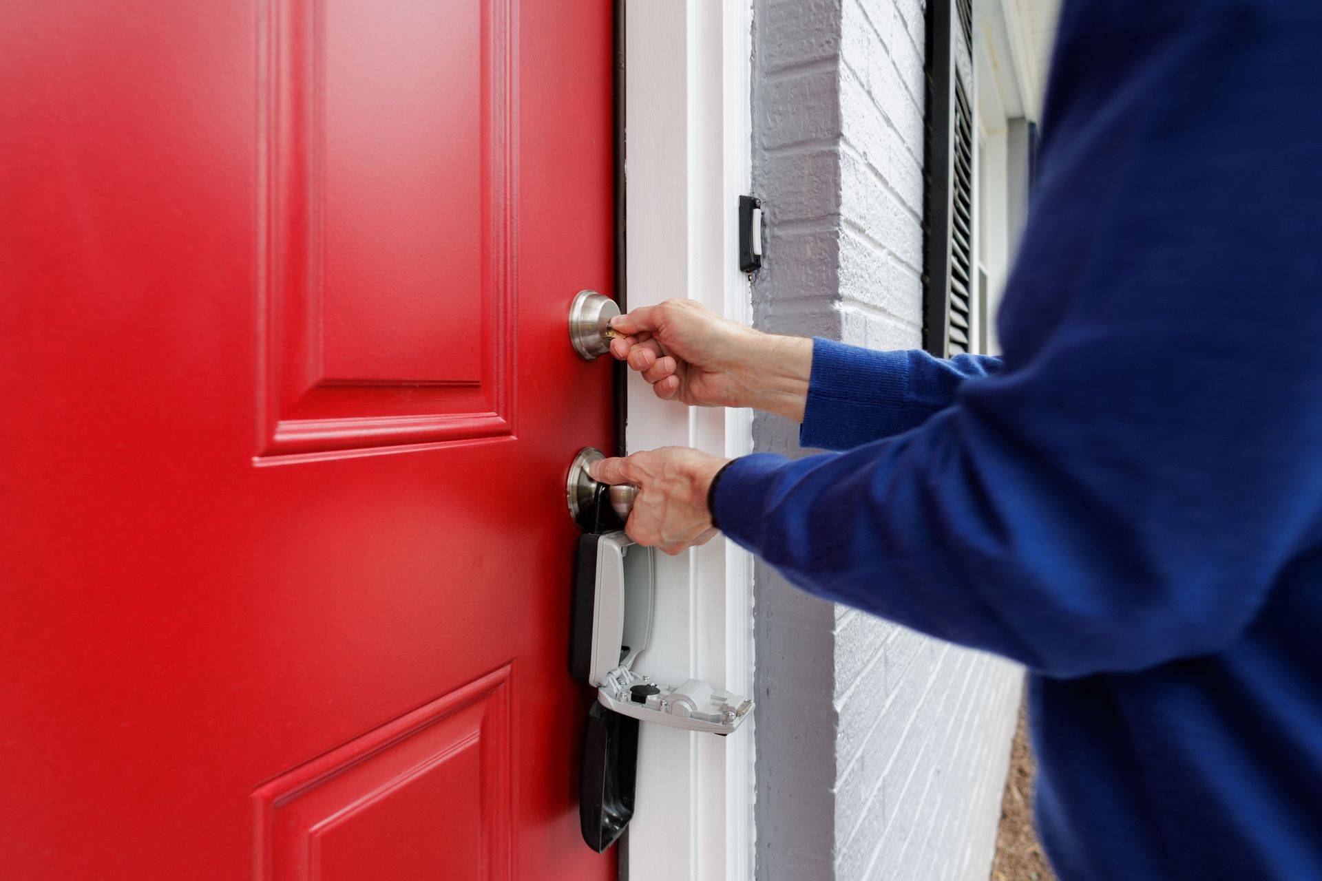 locksmith repairing door lock for rental property in Denver